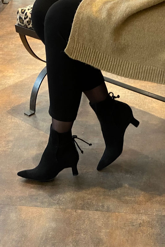 Matt black women's ankle boots with laces at the back. Tapered toe. Medium spool heels. Worn view - Florence KOOIJMAN